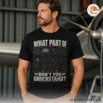 Man wearing black aviation humor t-shirt in airplane hangar setting