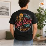 Model wearing black skeleton graphic tee with small front chest design