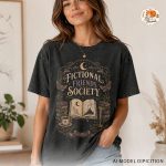 Fictional Friends Society book lover graphic tee on washed black shirt