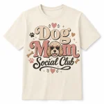 Dog Mom Social Club graphic tee on cream shirt with retro dog mom design