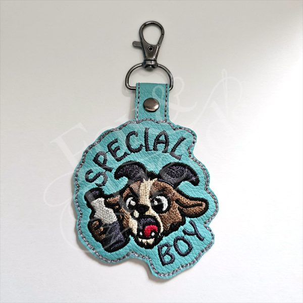 Special Boy DCC-Inspired Embroidered Goat Key Fob DCC inspired Special Boy embroidered goat key fob on aqua vinyl