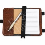 Open embroidered notebook cover with lined notebook, pen holder and interior pocket