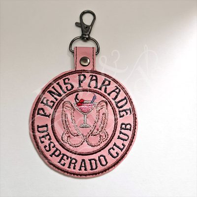DCC inspired Penis Parade Desperado Club embroidered key fob on dusty pink vinyl