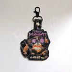 Princess Donut DCC inspired embroidered key fob with crown and purple sunglasses